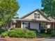 Traditional-style home with a well-maintained lawn, attractive landscaping, shutters, and a welcoming entryway at 307 Gladstone Dr, Mcdonough, GA 30253