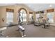 Well-equipped fitness center with various exercise machines, including a treadmill, elliptical, and weight-lifting equipment at 307 Gladstone Dr, Mcdonough, GA 30253