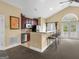 Clubhouse kitchenette featuring stainless steel appliances, granite countertops, breakfast bar, and easy access to pool at 307 Gladstone Dr, Mcdonough, GA 30253