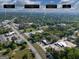Aerial view of property with approximate boundary lines, showing access to the main road, and surrounding greenery at 174 E Broad St, Fairburn, GA 30213