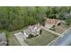 Aerial shot of a two-story home with a well-kept lawn and established trees at 225 Briarsweet Way, Fayetteville, GA 30215