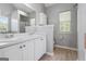 Bathroom with double sink vanity with storage and a separate enclosed shower-tub at 225 Briarsweet Way, Fayetteville, GA 30215