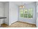 Dining area with a closet and a view of the backyard at 225 Briarsweet Way, Fayetteville, GA 30215
