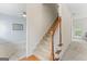 Carpeted staircase with wood railing leading to the upper level at 225 Briarsweet Way, Fayetteville, GA 30215
