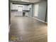 Bright kitchen with white cabinetry and stainless steel sink; a blank canvas for your dreams at 116 Stewart Ave, Jonesboro, GA 30236