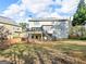 Expansive backyard featuring a two-story deck and landscaped garden at 3195 Vickery Ne Dr, Marietta, GA 30066