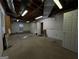 Unfinished basement area with exposed ductwork, pegboard, and open layout, offering ample storage space at 3195 Vickery Ne Dr, Marietta, GA 30066