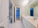 Bathroom featuring a double vanity and tile floors at 3195 Vickery Ne Dr, Marietta, GA 30066