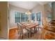 Dining area featuring natural light, hardwood flooring, and enough space for a dining table at 3195 Vickery Ne Dr, Marietta, GA 30066