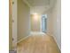Hallway with neutral walls and carpeted floors leading to various rooms at 3195 Vickery Ne Dr, Marietta, GA 30066