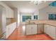 Well-lit kitchen with stainless steel appliances, granite countertops and ample cabinet space at 3195 Vickery Ne Dr, Marietta, GA 30066