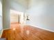 Spacious living area with hardwood floors leading to the dining room and staircase at 3195 Vickery Ne Dr, Marietta, GA 30066