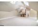 Spacious bonus room with a kitchenette, multiple ceiling fans, and a skylight at 110 Kylemore Pass, Tyrone, GA 30290