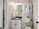 Bathroom featuring white vanity, granite countertop, and coordinated accessories for a clean, modern look at 140 Crimson Rdg, Tyrone, GA 30290
