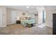 Bright bedroom featuring vaulted ceiling, neutral walls and carpet, and a large bed with colorful bedding at 140 Crimson Rdg, Tyrone, GA 30290