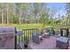 Spacious deck features outdoor seating and a grill, perfect for outdoor entertaining at 140 Crimson Rdg, Tyrone, GA 30290