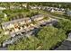 Beautiful aerial view of a suburban neighborhood with tree-lined streets and well-kept homes at 11419 South Grove Dr, Hampton, GA 30228