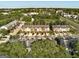 Beautiful aerial view of a suburban neighborhood with tree-lined streets and well-kept homes at 11419 South Grove Dr, Hampton, GA 30228