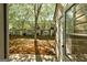 Exterior view of home with backyard and trees at 11419 South Grove Dr, Hampton, GA 30228