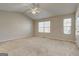 Spacious bedroom with carpet flooring, vaulted ceiling and lots of natural light at 11419 South Grove Dr, Hampton, GA 30228