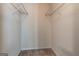 Walk-in closet featuring shelving for storing clothes and accessories at 11419 South Grove Dr, Hampton, GA 30228