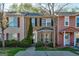 Charming brick townhome featuring a well-maintained front yard and classic architectural details at 11419 South Grove Dr, Hampton, GA 30228