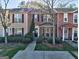 Charming townhouse with a well-maintained lawn and inviting front entrance at 11419 South Grove Dr, Hampton, GA 30228