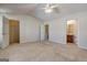 Primary bedroom featuring ensuite bathroom and walk-in closet at 11419 South Grove Dr, Hampton, GA 30228