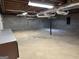 Unfinished basement featuring exposed ductwork, concrete floors, and cinder block walls at 183 Busbin Rd, Fayetteville, GA 30215