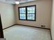 Bedroom featuring carpet, a large window, and neutral walls at 183 Busbin Rd, Fayetteville, GA 30215