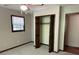 Cozy bedroom with carpet, a window, and closet space at 183 Busbin Rd, Fayetteville, GA 30215