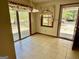 Cozy dining area with tile floors, adjacent to an outdoor space and a standard door at 183 Busbin Rd, Fayetteville, GA 30215