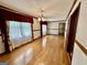 Well-lit dining room with wood floors, traditional decor, and ample natural light at 183 Busbin Rd, Fayetteville, GA 30215