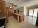 Spacious kitchen with tile flooring, a large island, and stainless steel appliances at 183 Busbin Rd, Fayetteville, GA 30215