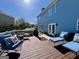 Large outdoor deck with furniture, ideal for relaxing and enjoying sunny days at 1600 Prospect Pl, Locust Grove, GA 30248