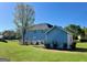 Large backyard featuring new construction storage building at 1600 Prospect Pl, Locust Grove, GA 30248