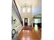 Spacious foyer with high ceilings and hardwood floors providing a warm and welcoming entrance at 1600 Prospect Pl, Locust Grove, GA 30248