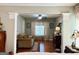 Comfortable living room with hardwood floors, sofa, and ceiling fan with nice decor at 1600 Prospect Pl, Locust Grove, GA 30248