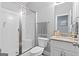 Bathroom with glass enclosed shower, granite countertops, and a vanity at 4402 Kady Ct, Mcdonough, GA 30252