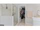 Modern bathroom features a glass shower, walk-in closet, and neutral decor at 4402 Kady Ct, Mcdonough, GA 30252