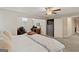Bright bedroom with plush carpeting, ceiling fan, desk and dresser at 4402 Kady Ct, Mcdonough, GA 30252