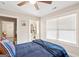 Bedroom featuring a ceiling fan, a large window, and an attached closet at 4402 Kady Ct, Mcdonough, GA 30252