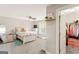Cozy bedroom featuring a ceiling fan, natural light, and a walk-in closet at 4402 Kady Ct, Mcdonough, GA 30252