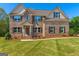 Charming two-story brick home with well-manicured lawn and a welcoming entrance at 4402 Kady Ct, Mcdonough, GA 30252