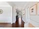 Bright hallway with hardwood floors and a view of the backyard at 4402 Kady Ct, Mcdonough, GA 30252