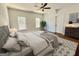 Serene bedroom with hardwood floors, natural light, and a ceiling fan at 906 Winall Down Ne Rd, Atlanta, GA 30319