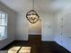Dining Room featuring chandelier and hardwood flooring at 906 Winall Down Ne Rd, Atlanta, GA 30319