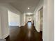 Hallway with hardwood floors, neutral paint, and modern lighting at 906 Winall Down Ne Rd, Atlanta, GA 30319