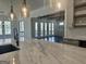 Modern kitchen boasts a marble countertop island, pendant lighting, and stainless steel appliances at 906 Winall Down Ne Rd, Atlanta, GA 30319