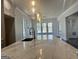 Kitchen featuring a large island with marble countertops and pendant lighting at 906 Winall Down Ne Rd, Atlanta, GA 30319